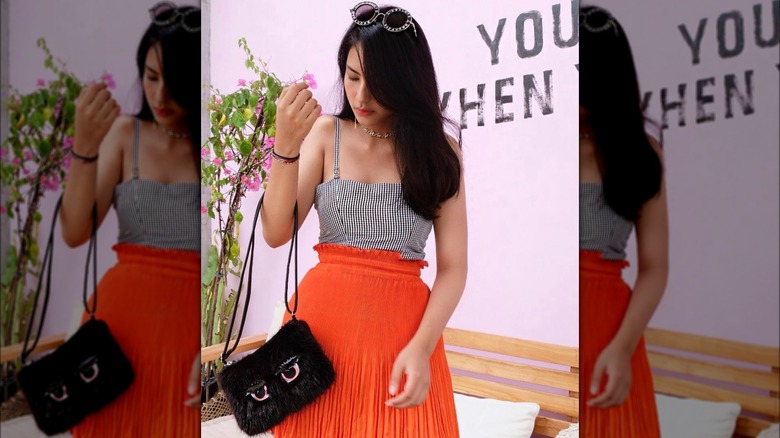 Woman in orange cupcake skirt