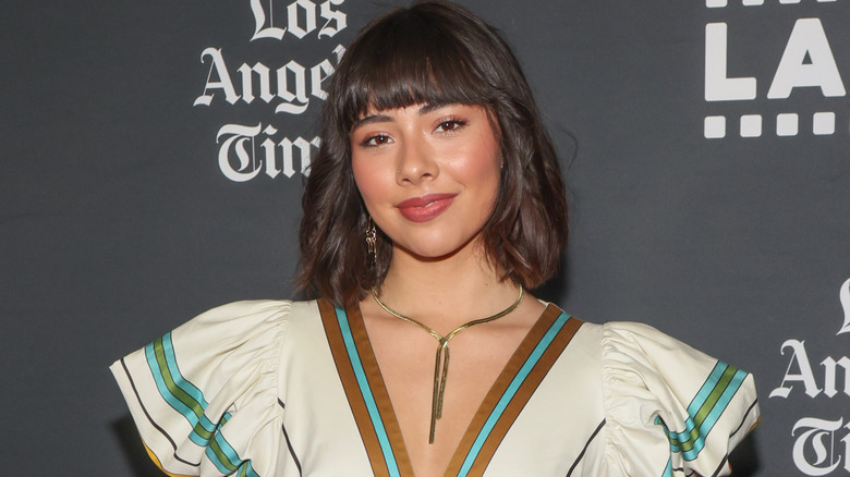 Xochitl Gomez gold necklace wavy lob