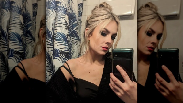 A woman wearing a '90s messy bun