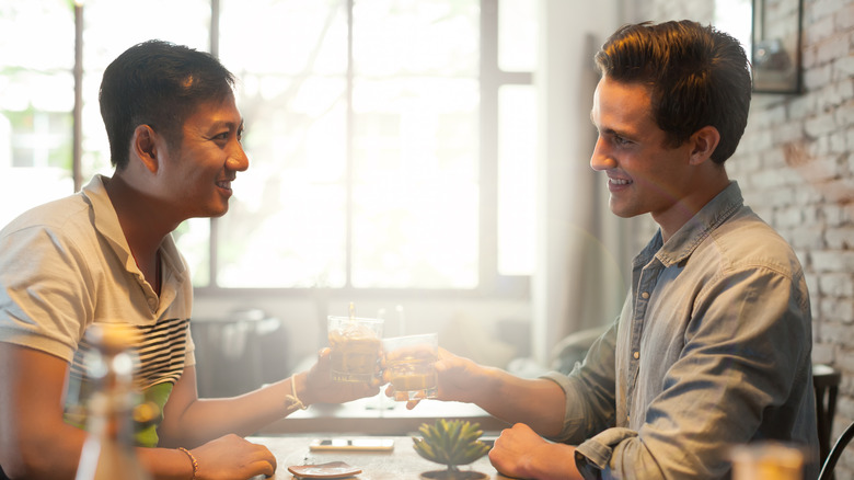 Couple toasting glasses
