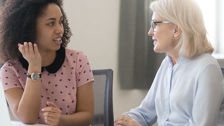 woman talking with her boss