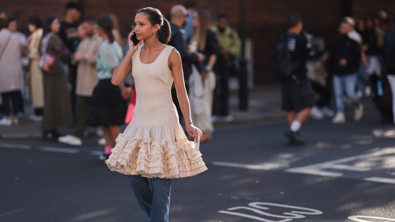 woman wearing pink drop waist dress 