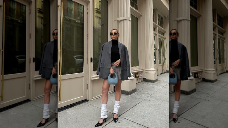 Influencer carrying a denim handbag