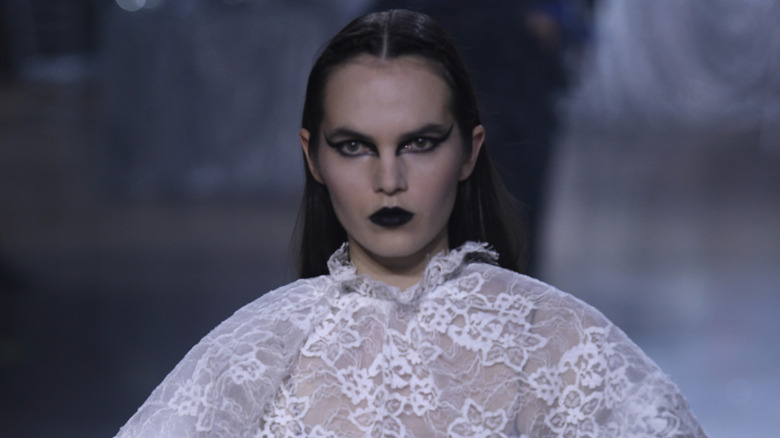 model walking the Rodarte runway