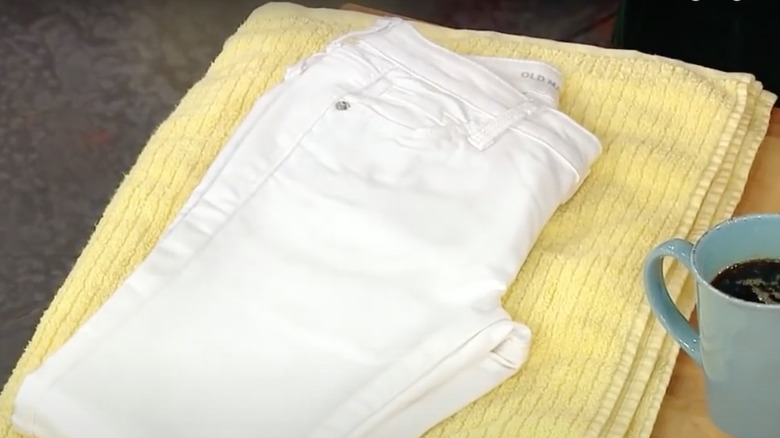 white pants lying out to dry 