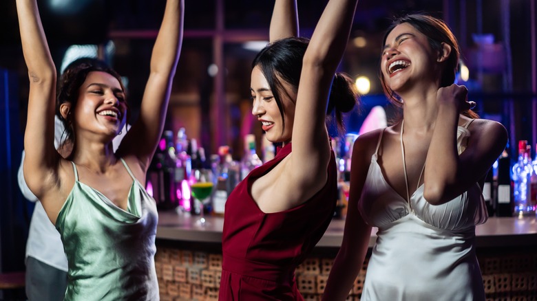 Women wearing party dresses