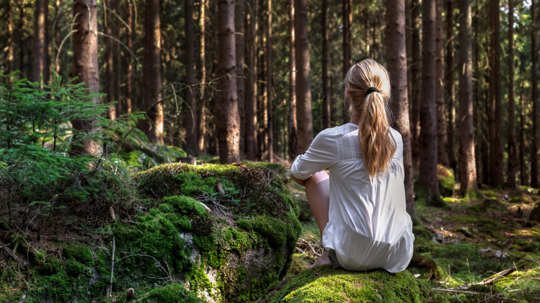 Woman meditating in nature
