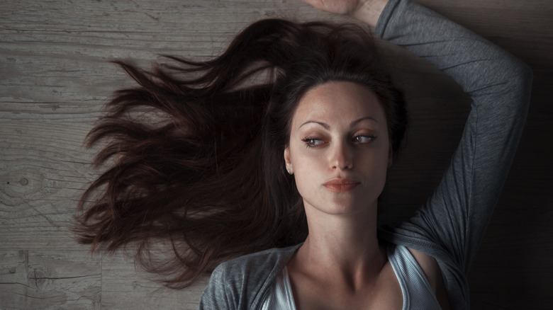 woman relaxing on floor
