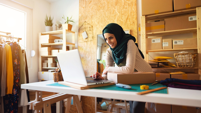 woman in hijab working