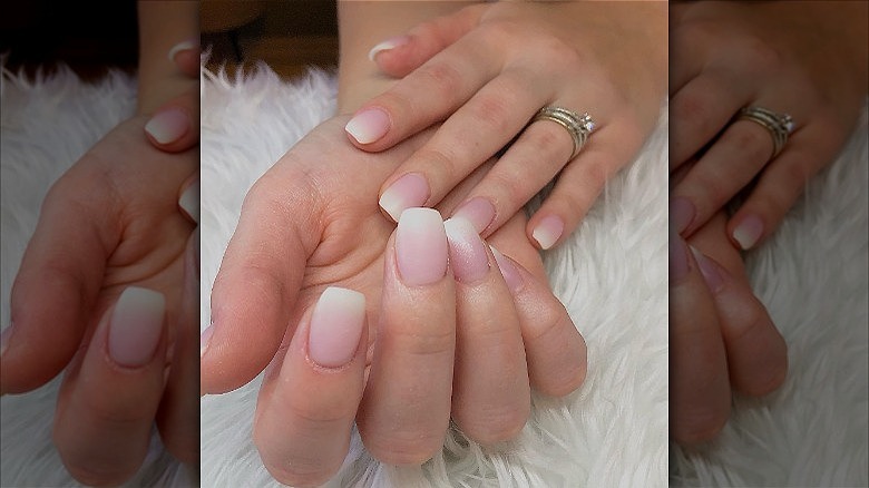 hands with matte french fade nails