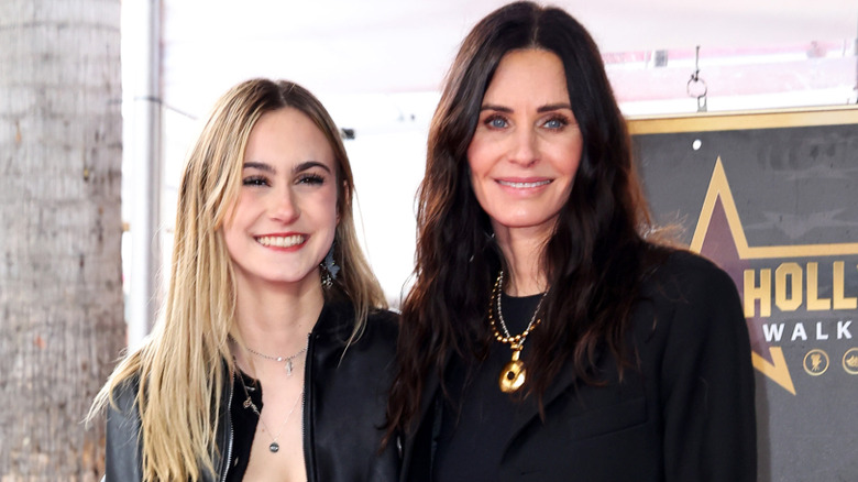 Coco Arquette and Courtney Cox smiling