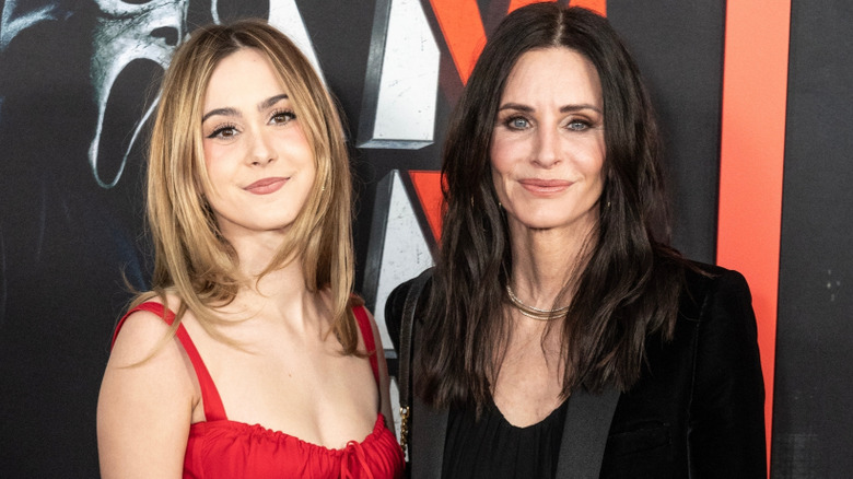 Courteney Cox and Coco Arquette smiling together at the 