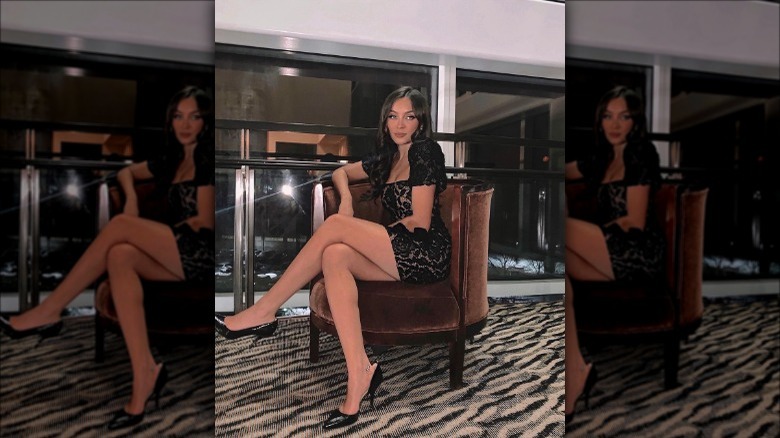 woman wearing black lace dress