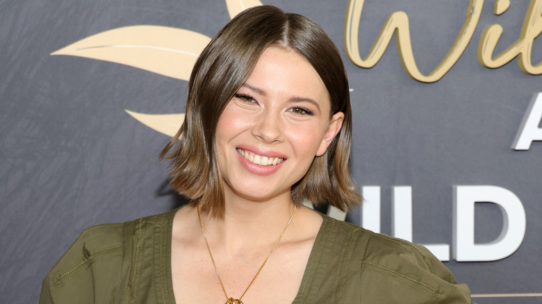 Bindi Irwin in a green dress