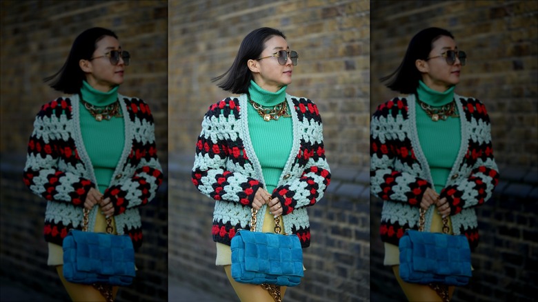 woman wearing crochet cardigan