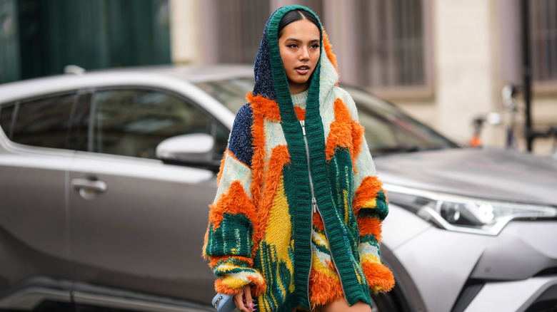 woman wearing fuzzy cardigan