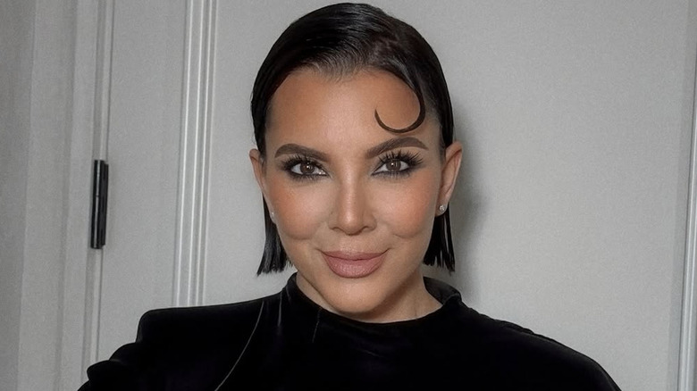 Kris Jenner posing with her new wet-hair look