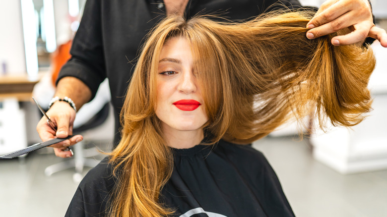 woman getting butterfly cut