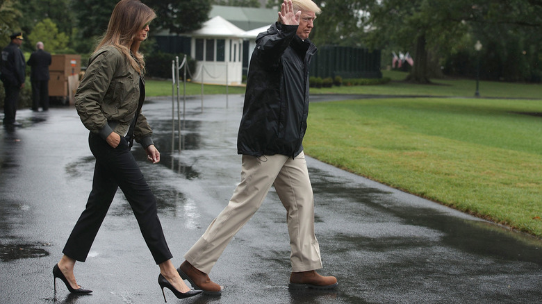 Melania Trump wearing stilettos next to Donald Trump at the White House