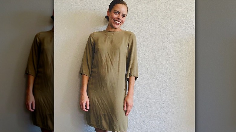 woman wearing khaki green dress