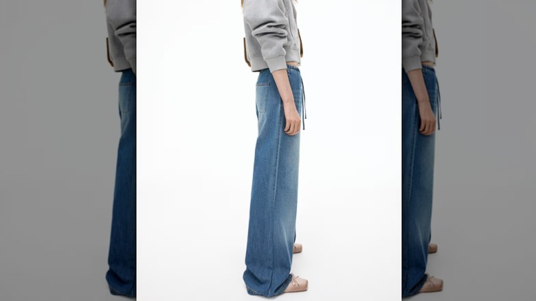 A model wearing drawstring jeans from H&M