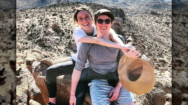 Norma Kuhling and her partner smiling while hiking