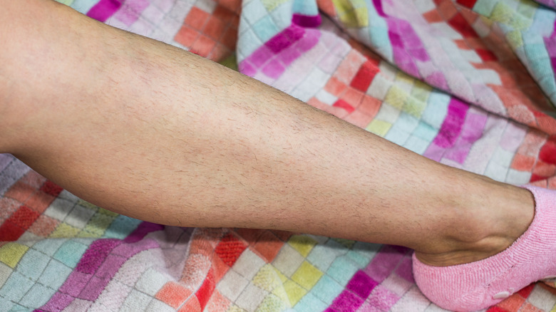 Woman with hairy leg