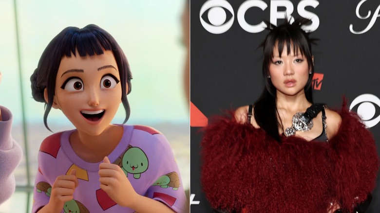 Zoey from "KPop Demon Hunters" and Rei Ami wearing a black-and-red outfit at the 2025 VMAs