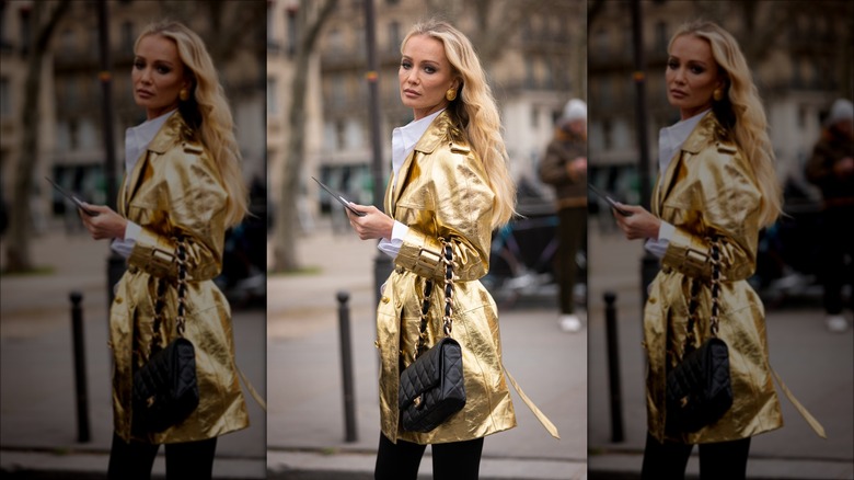 woman wearing metallic leather trenchcoat