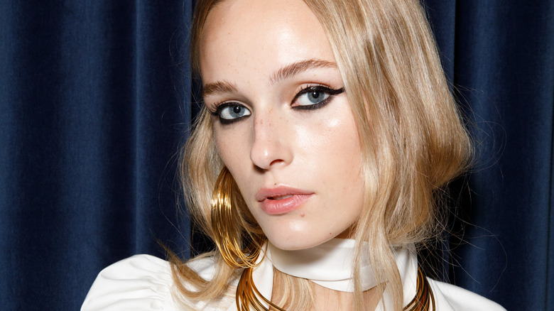 Model in white dress