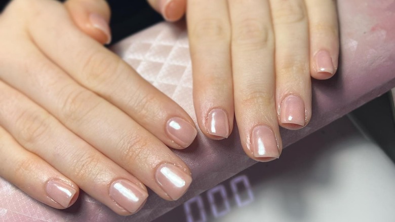close up of nude pink manicure