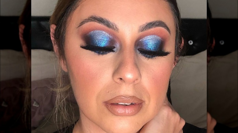 Bronze lips and metallic blue shadow