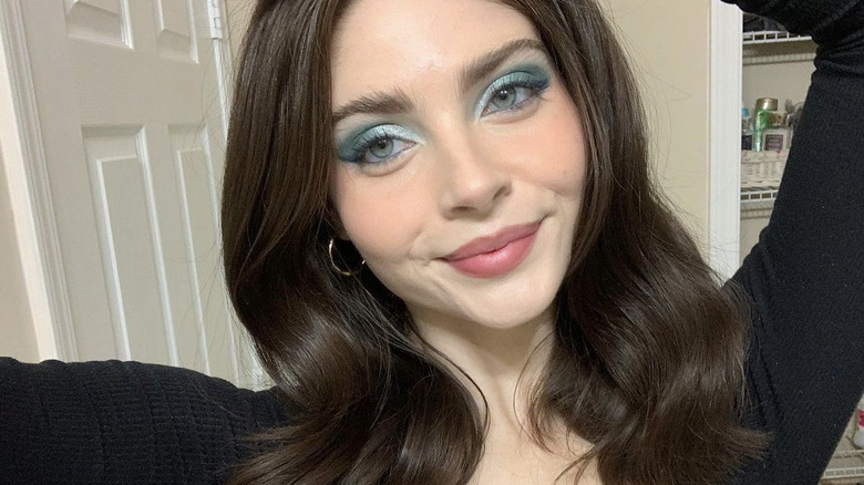 Mid-range pink lipstick and light blue shadow