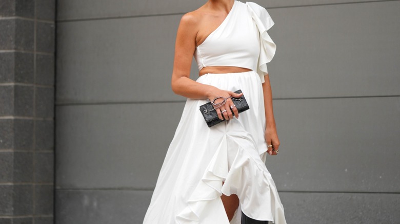 woman wearing asymmetrical dress