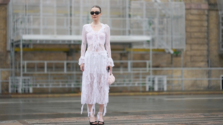 woman wearing white lace dress
