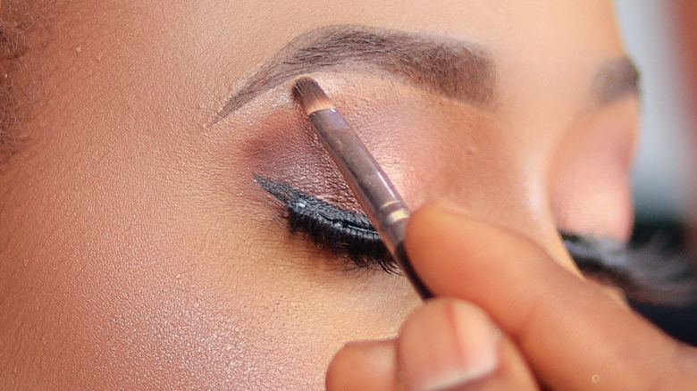 Close-up of highlighter application