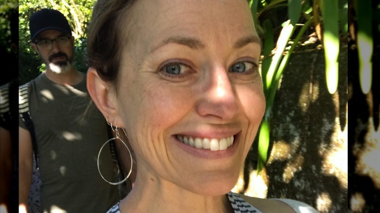 Rebecca Spence takes a selfie on a hike with her husband