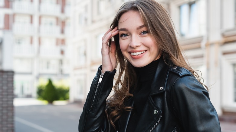 Woman in black monochrome outfit 
