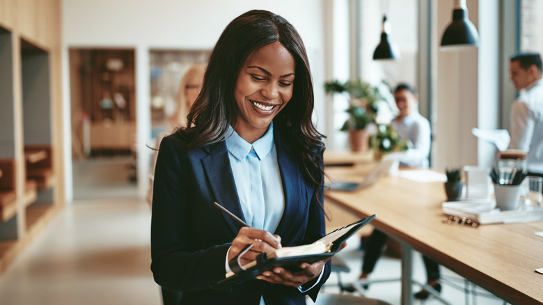 Woman "writes things down."