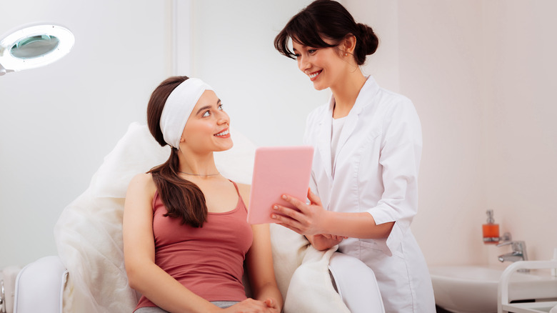 Spa tech consulting with client  