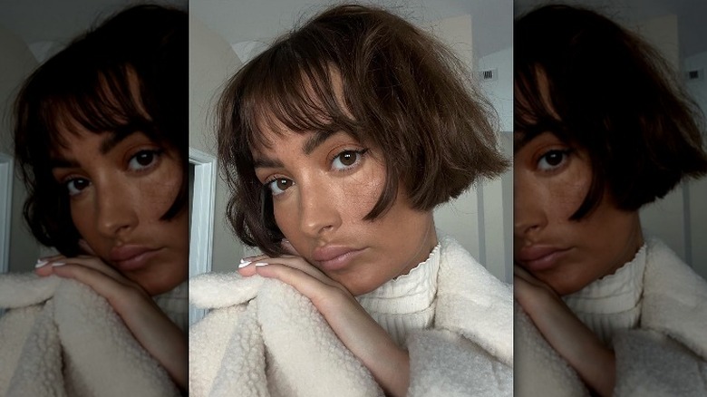 woman with micro-bob with bangs