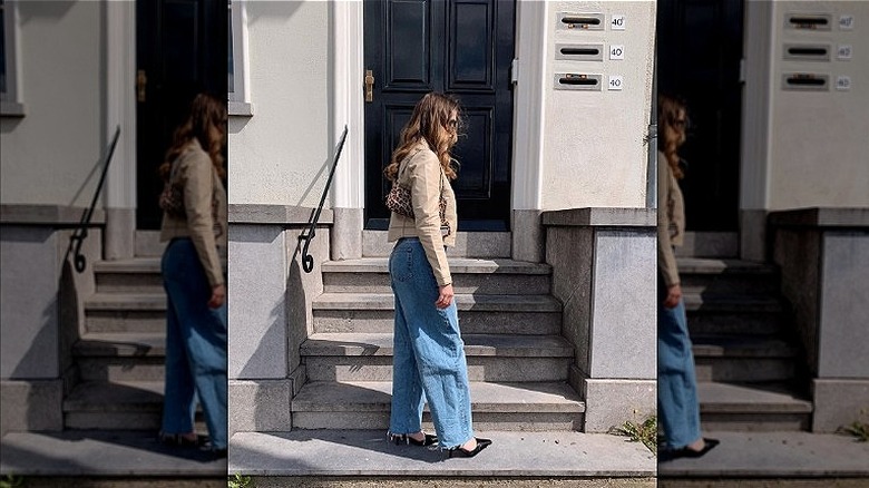 Girl carrying cheetah print mini bag