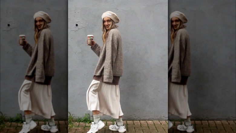 Woman in casual beige midi skirt