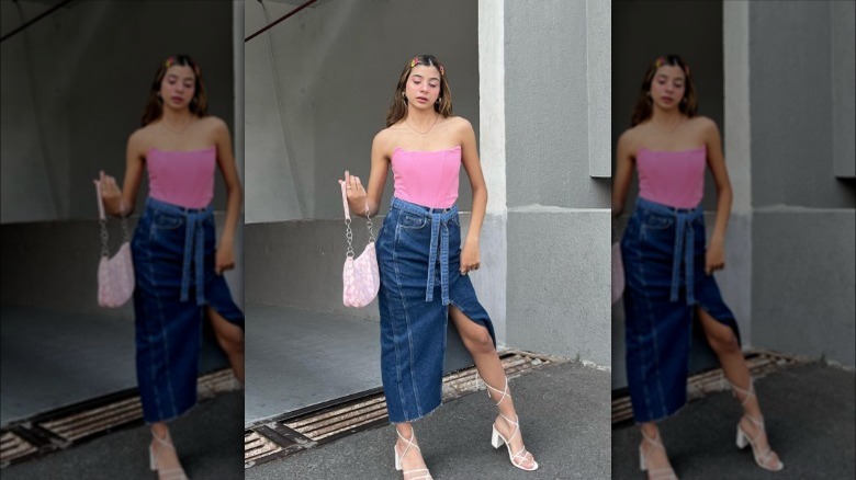 Woman in denim midi skirt