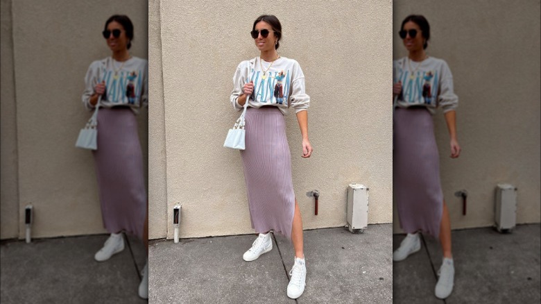 Woman in knitted midi skirt