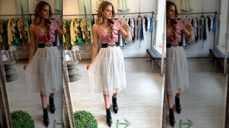 Woman in lace midi skirt