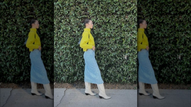 Woman in denim midi skirt