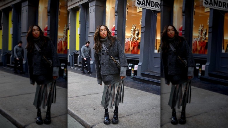 Woman in metallic midi skirt