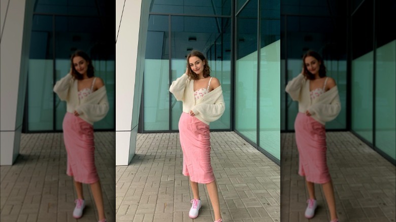 Woman in pink midi skirt