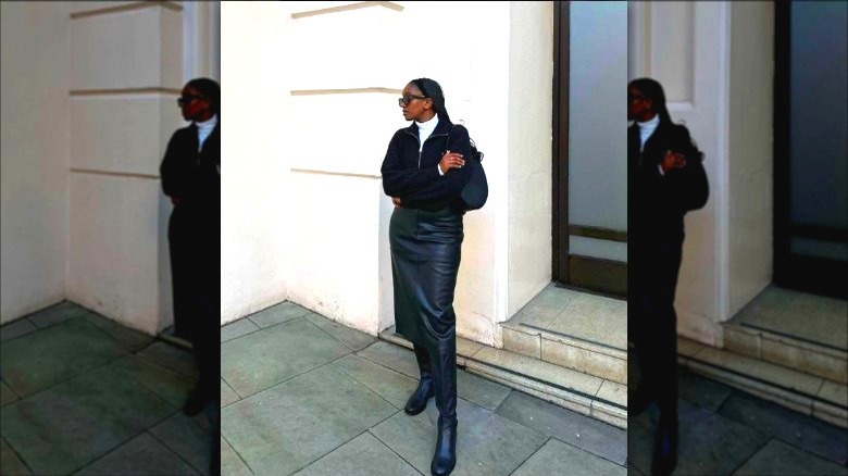 Woman in pleather midi skirt